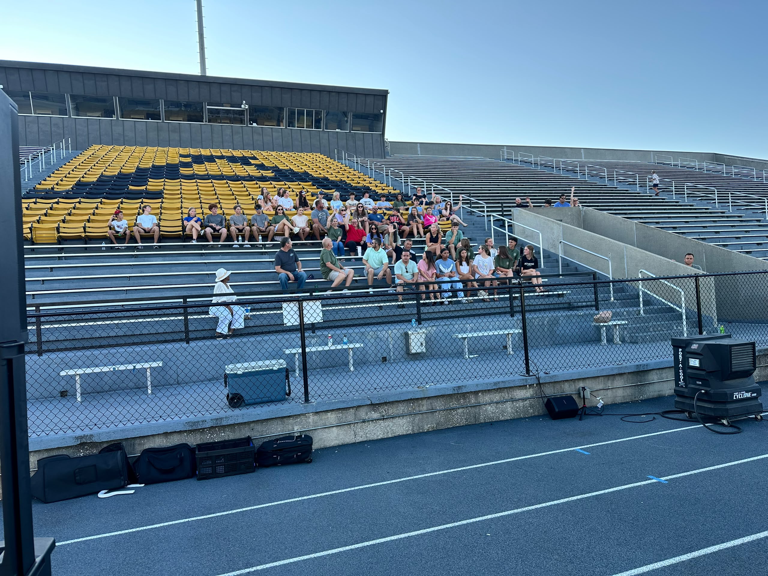 Crowd standing together in the stands